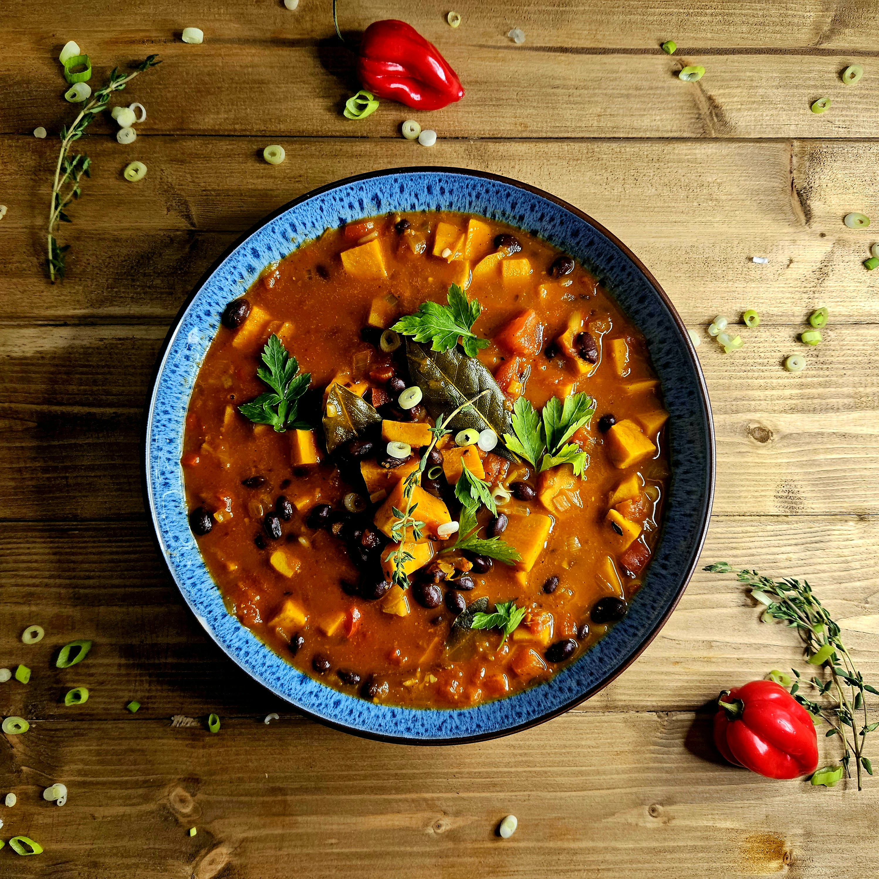 Vegan Sweet Potato and Black Bean Curry with a spicy curry sauce inspired by carribean cuisine and curry powder